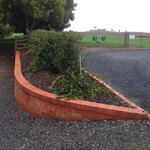 Reinforced brick wall