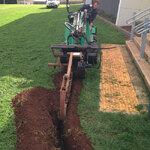 Advant loader with trencher